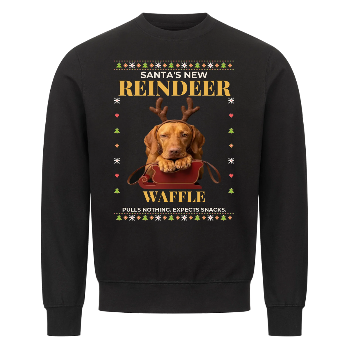 Santa's New Reindeer custom pet sweatshirt black - your dog with felt reindeer antlers lying behind a red toy sleigh, chin on its paws, knit Christmas border, with name