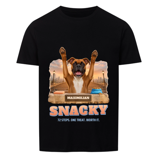 Snacky custom pet t-shirt black - your dog with both paws raised at the top of a stone staircase at sunrise, treat bag on the ledge, name on the bronze plaque, SNACKY in peach letters